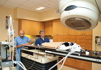 Veterinary professionals perform radiation therapy