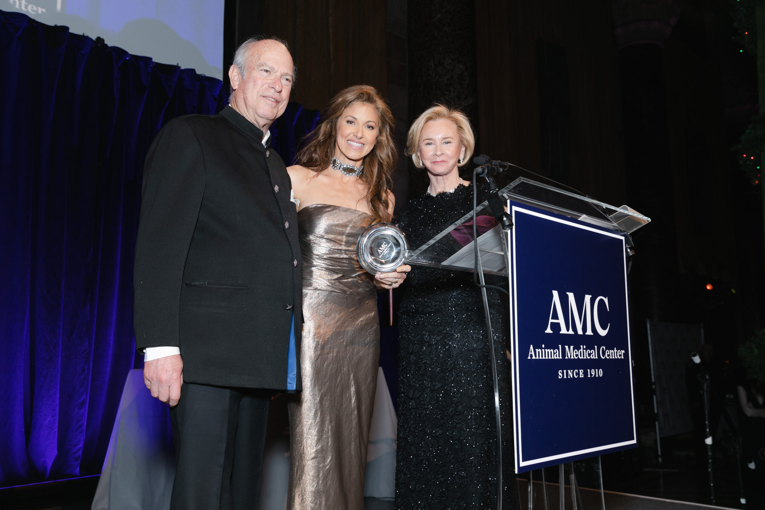 Dylan Lauren receiving the Brooke Astor Award from AMC CEO Kate Coyne and AMC Board Chair Robert Liberman