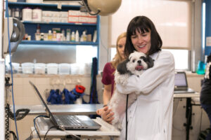 Dr. Heather Brausa holding patient