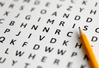 Pencil lying on top of word search puzzle