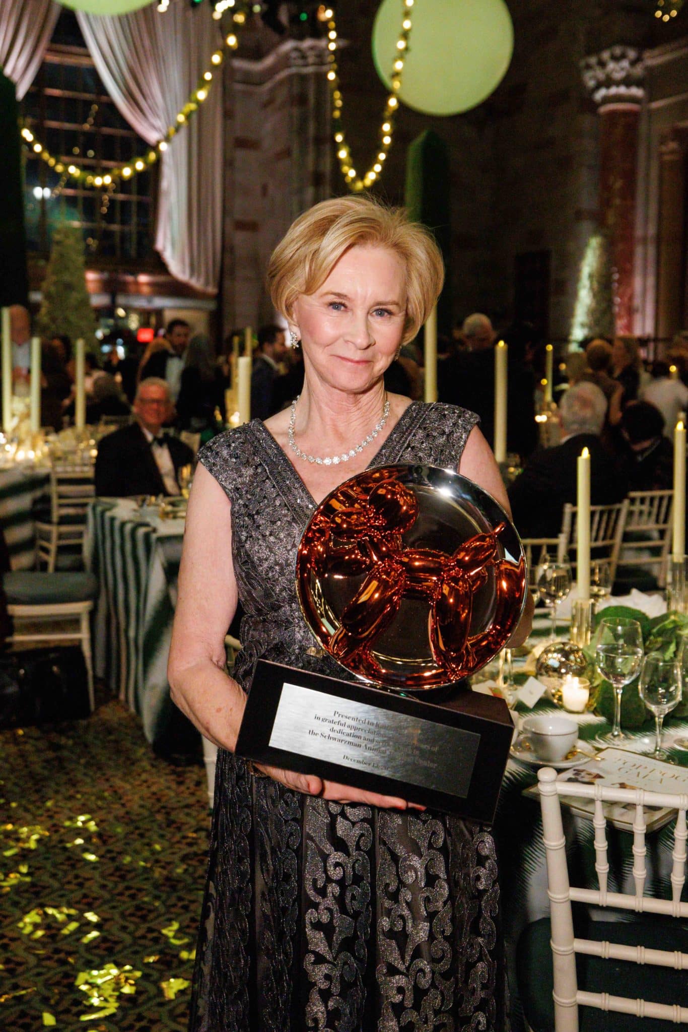 Kathryn Coyne with her award at AMC's Top Dog Gala